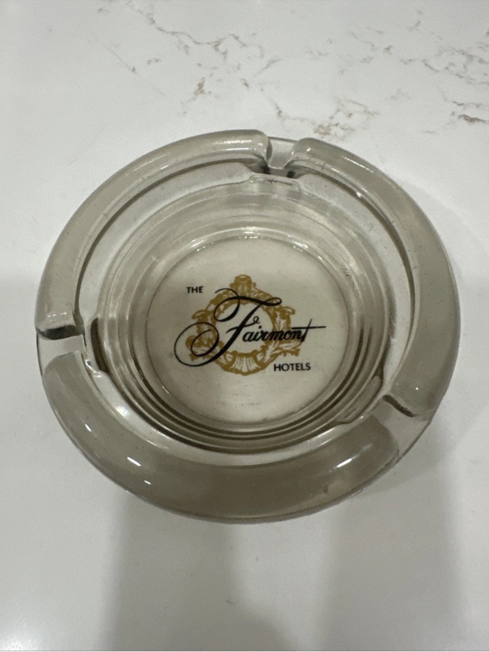 The Fairmont Hotels Glass Ashtray with Gold Logo